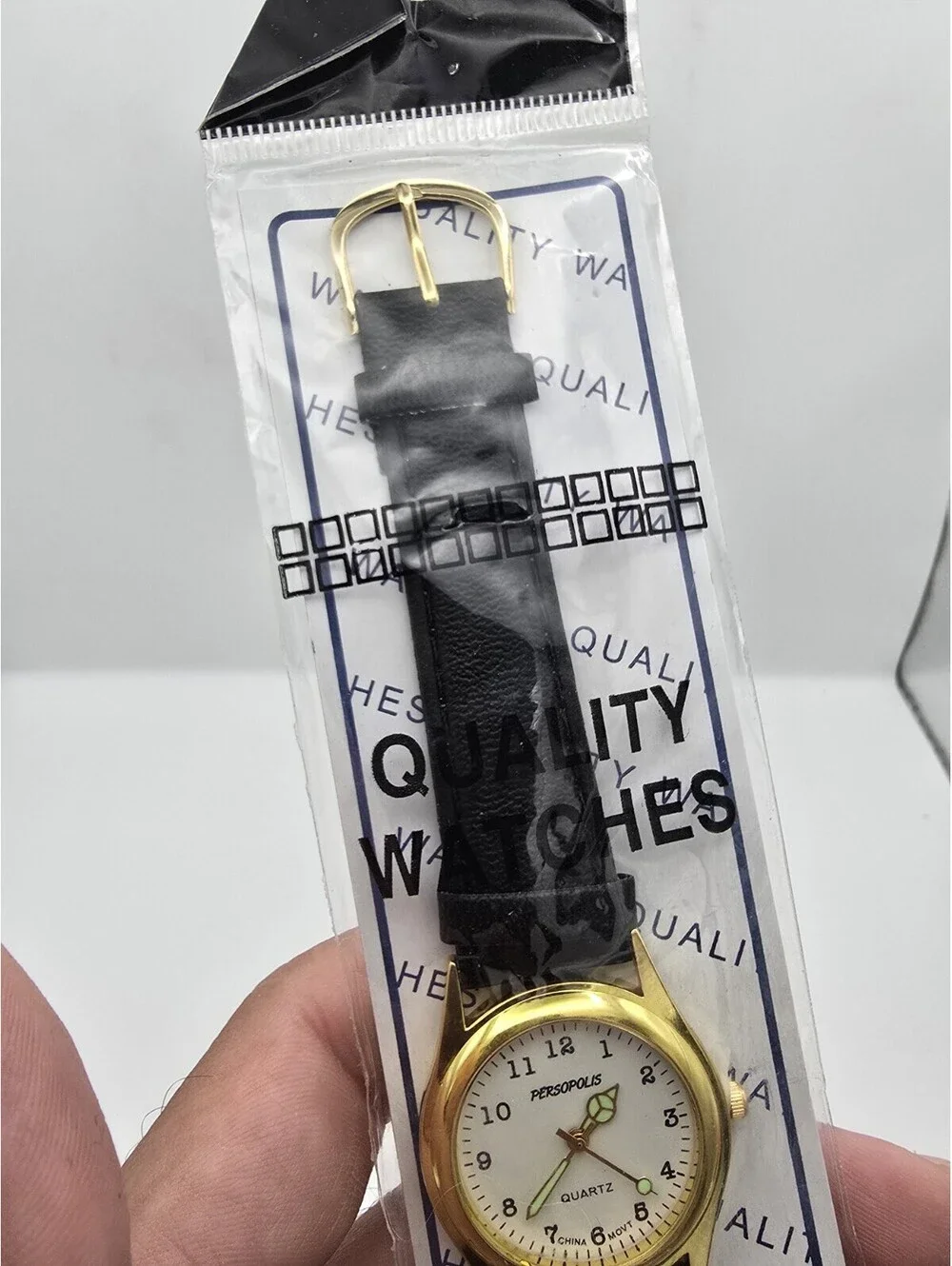 Persopolis Quartz Watch Gold Tone Case Cream Dial Luminous Hands Black Strap